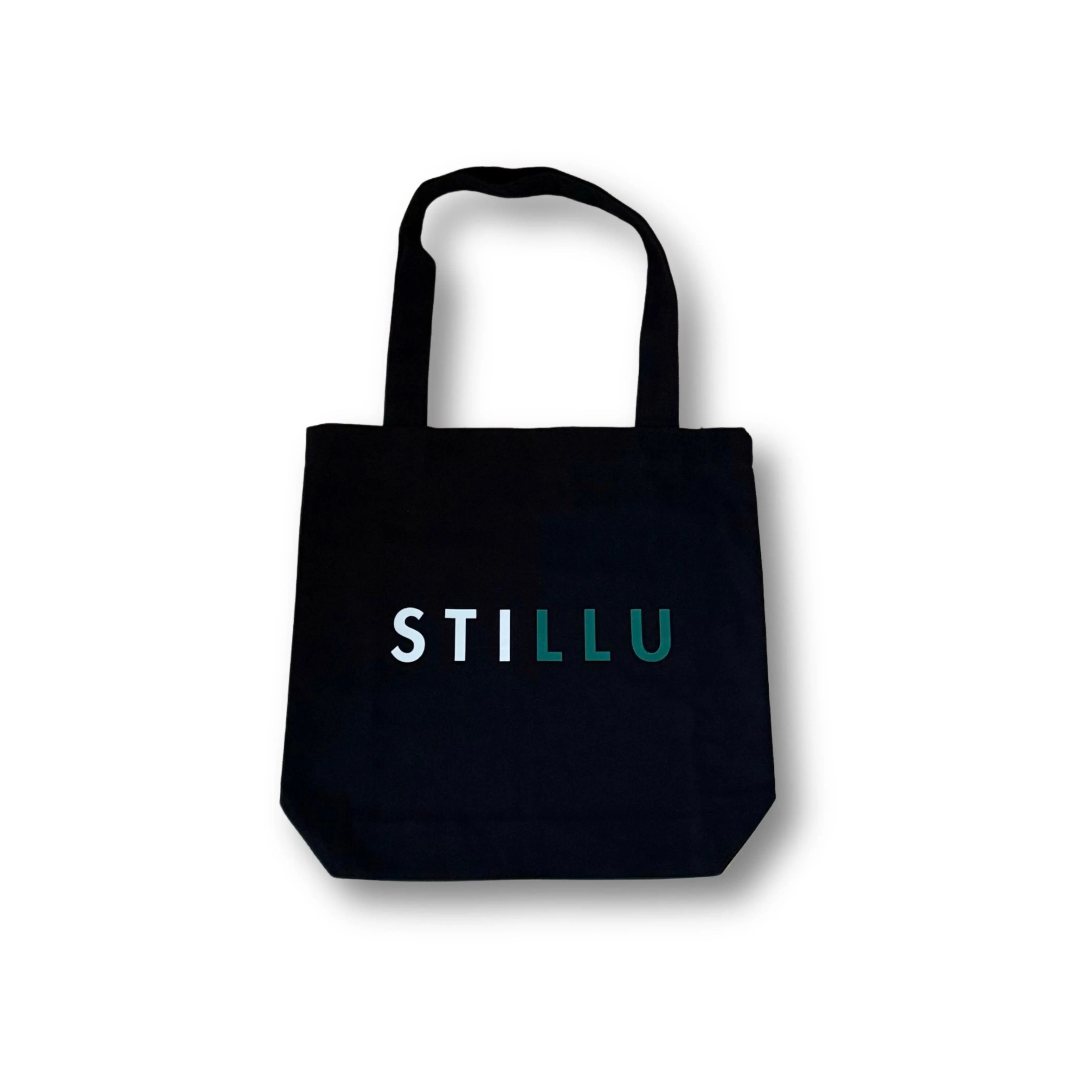 “STILLU pre-order badge graphic for premium faith-inspired tote bag.”