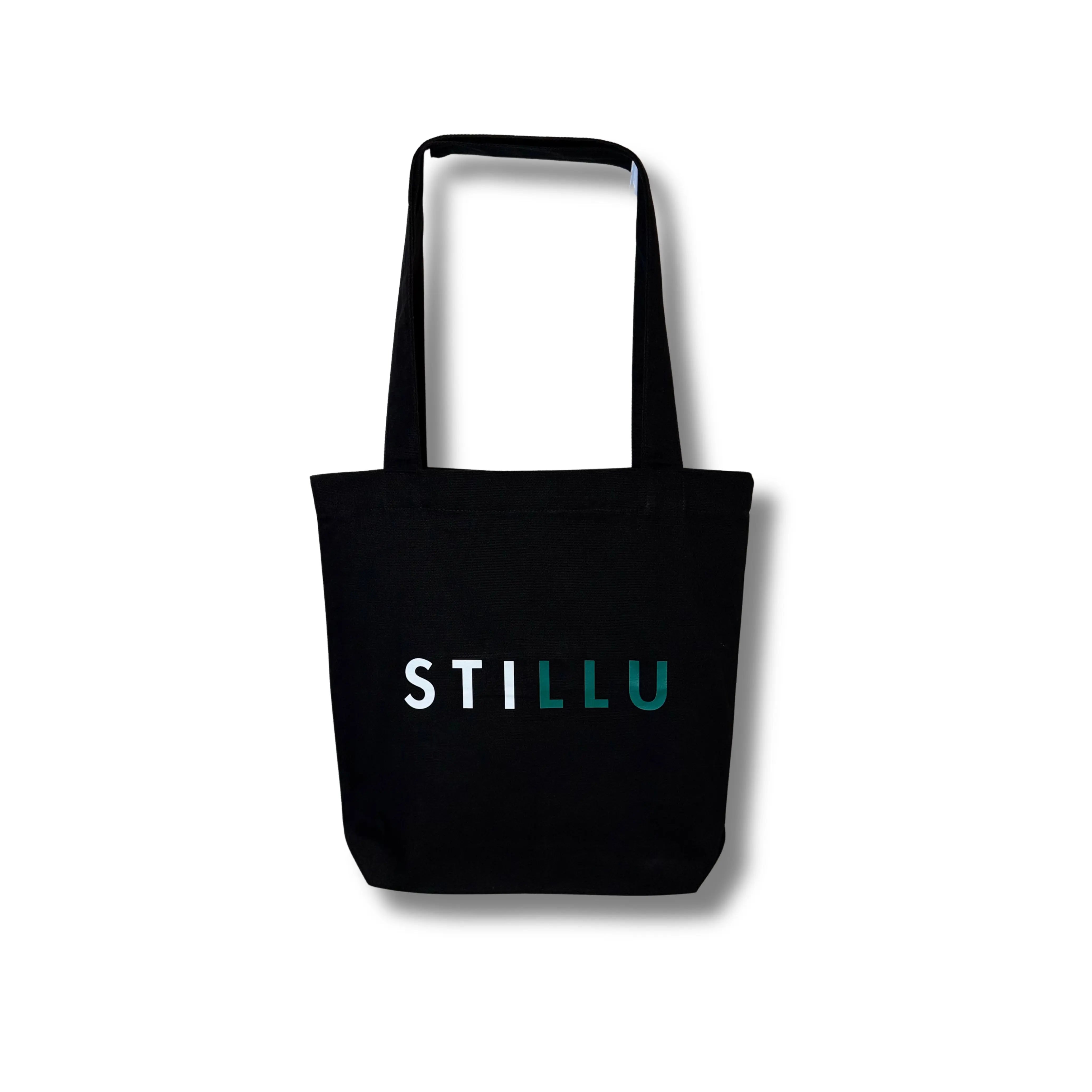 “STILLU premium black cotton tote bag – faith-inspired minimal design for daily self-growth.”
